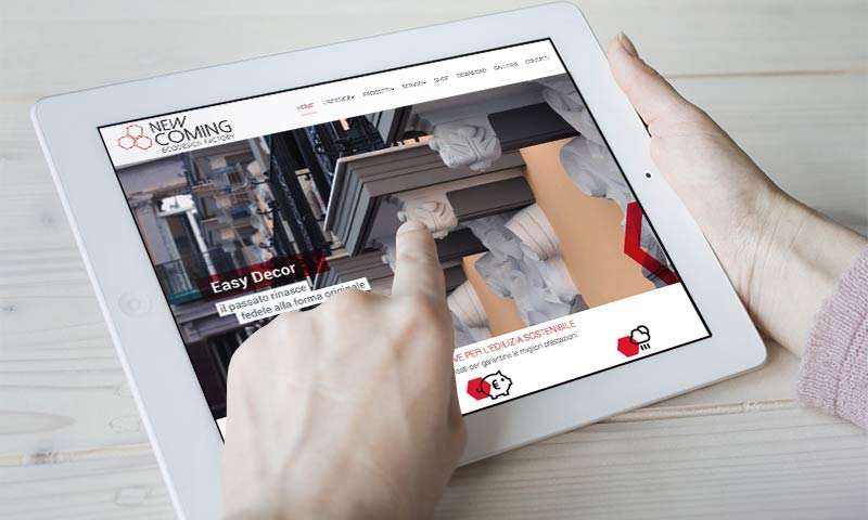 Immagine ipad responsive sito web New Coming -Agenzia di Comunicazione e Web Libellula Grafica Lab